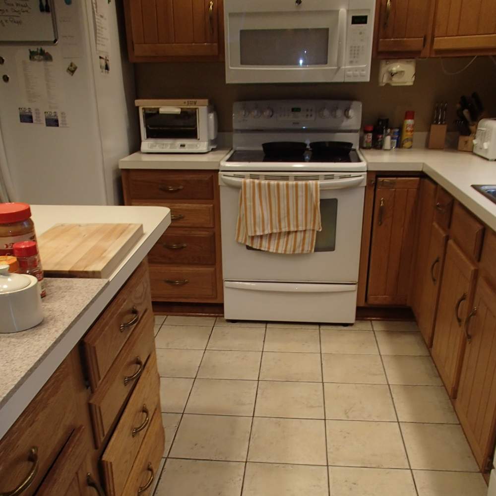 Modern Combination Of Rich Brown And Soft Grey Kitchen Remodel by Repp Renovations project photo 9